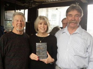 Susan at her book signing pictured with her writing coach Jedwin Smith (L) and husband Mike Jimison (R), a Vietnam pilot.