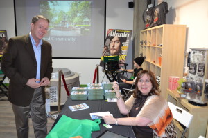 Travis Taylor, founder of the tourist blog, wanderlust Atlanta, getting his signed copy of Moving to Atlanta.